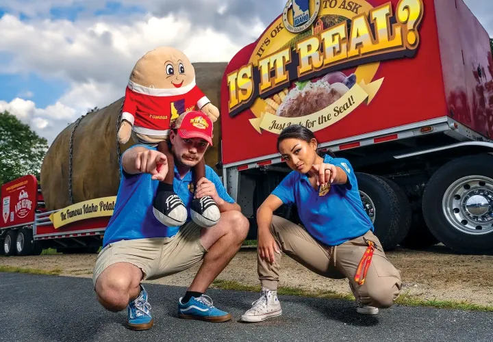 Tater Team Posing In Front Of Truck