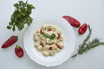 Idaho® Potato Gnocchi in Pimento Herb Cream Sauce 